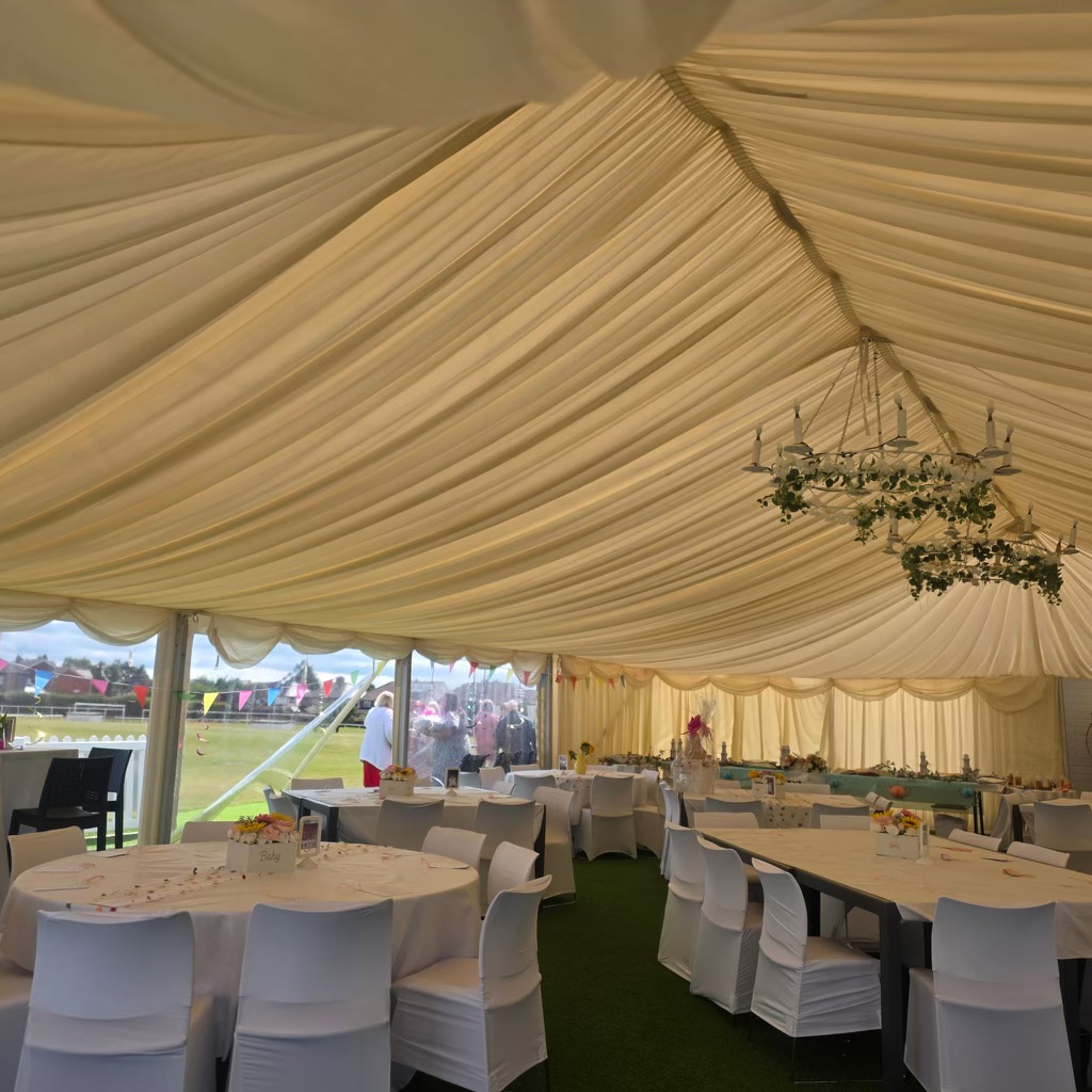 White Tables In Outdoor Marquee For Baby Shower 3