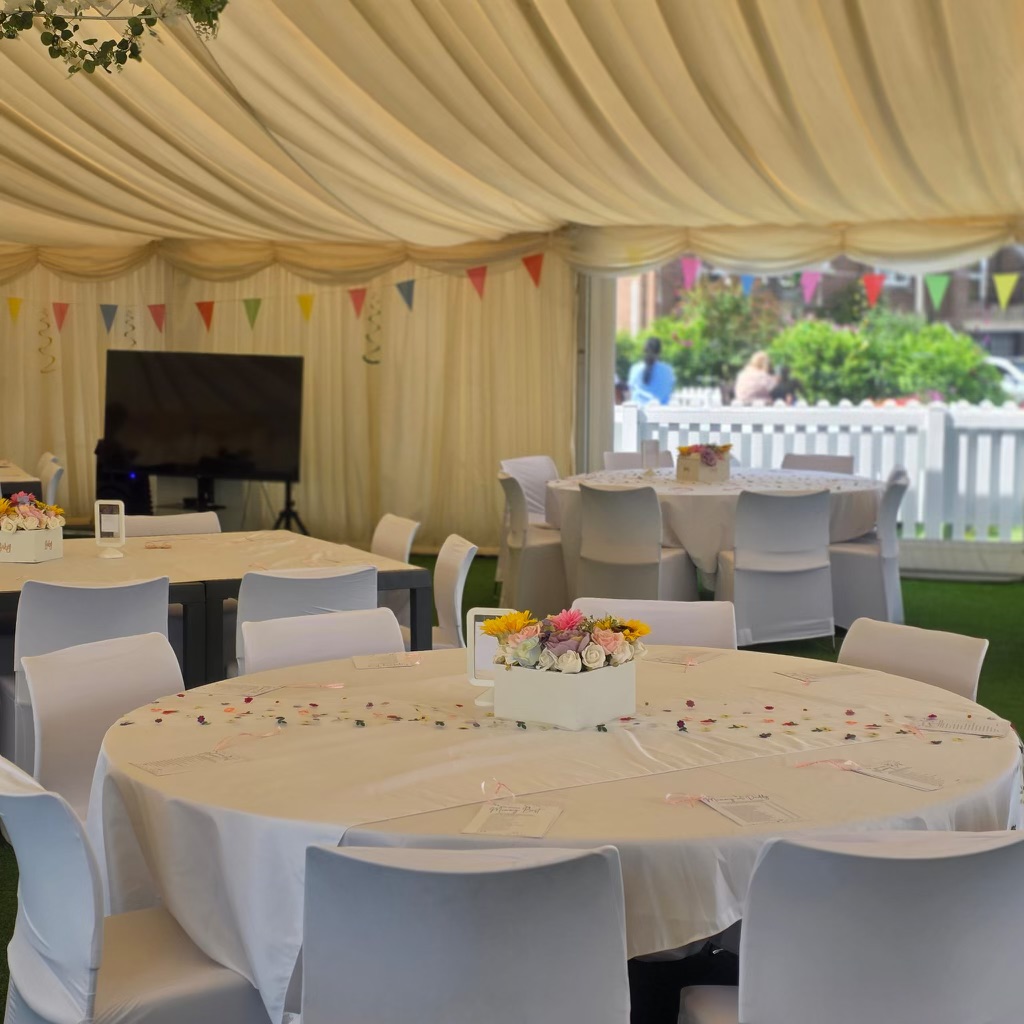 White Table In Outdoor Marquee For Baby Shower